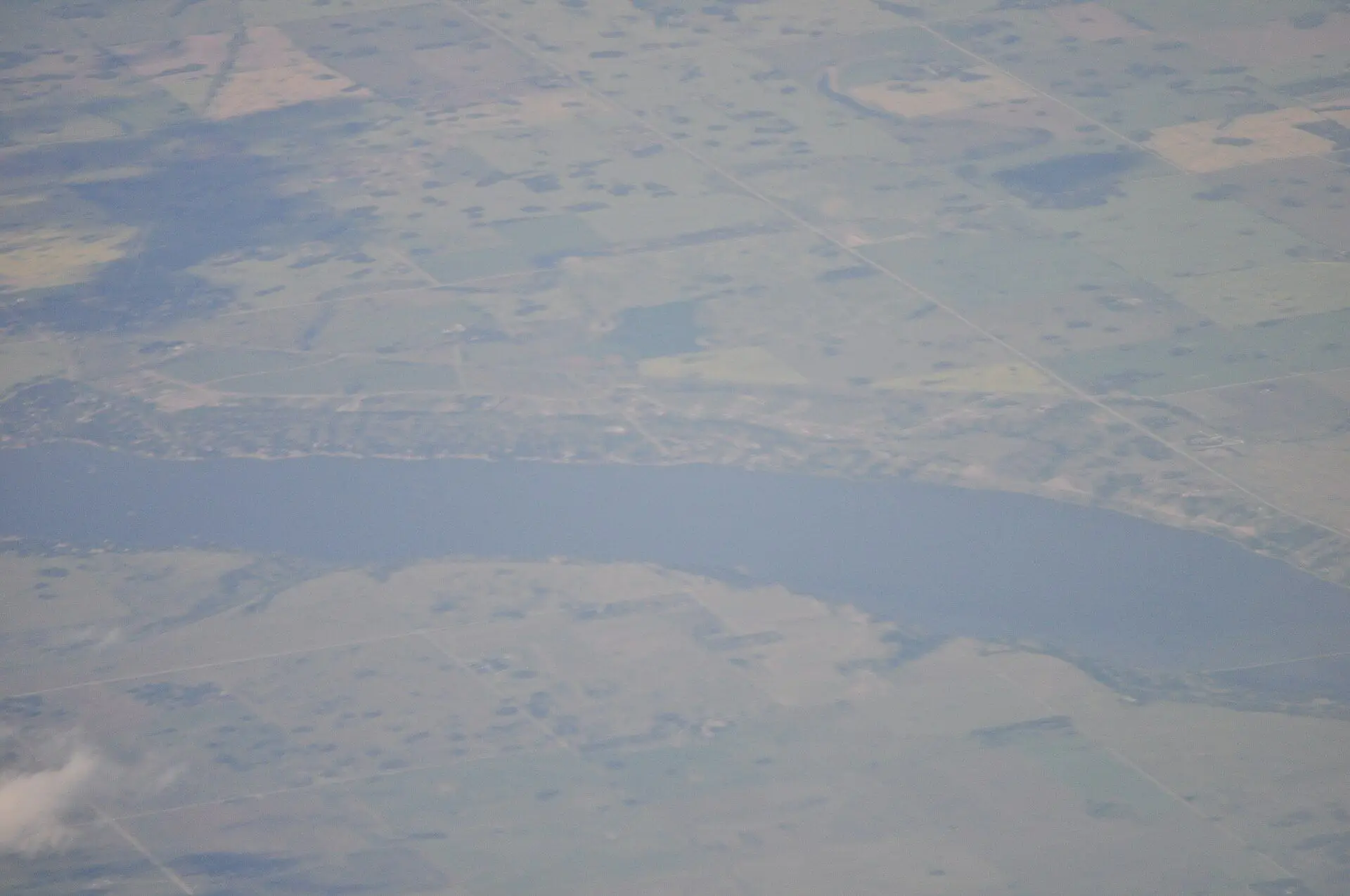 Aerial view of Last Mountain Lake and farmland